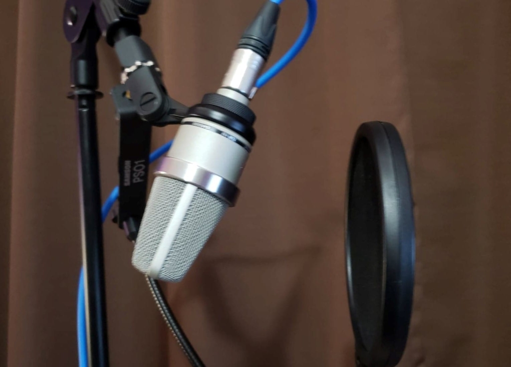 Pop filter setup to reduce plosive issues